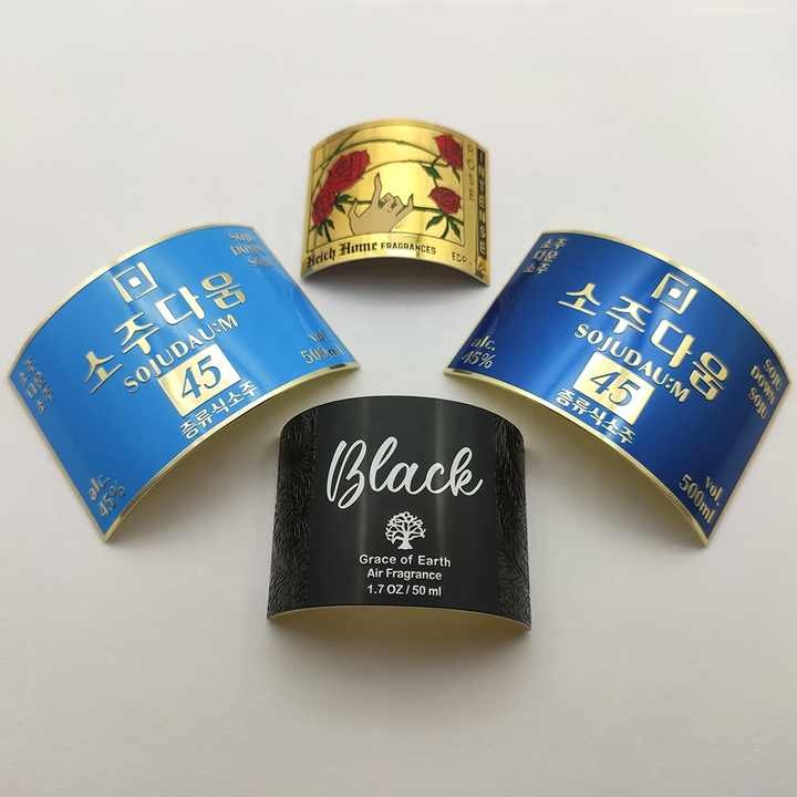 中国工厂生产的瓶用铝金属贴纸自粘金属铭牌箔压花弯曲贴纸酒标